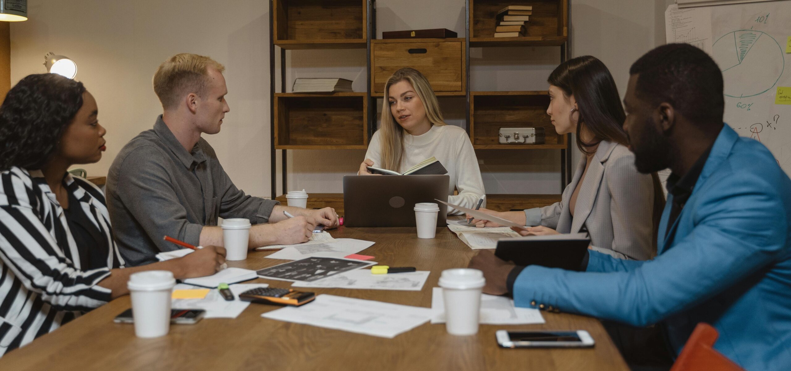Volunteer board at work around a table