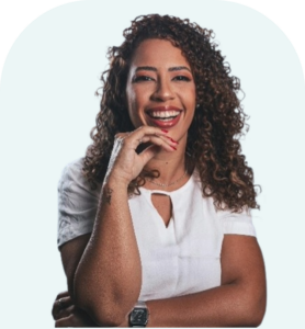 Smiling woman with curly hair and a white shirt